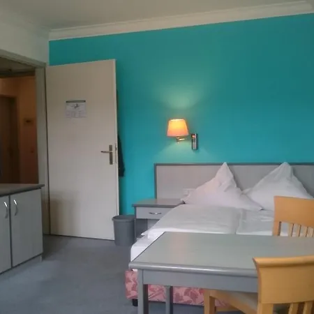 Bed & Kitchen Cityappartments Apartment